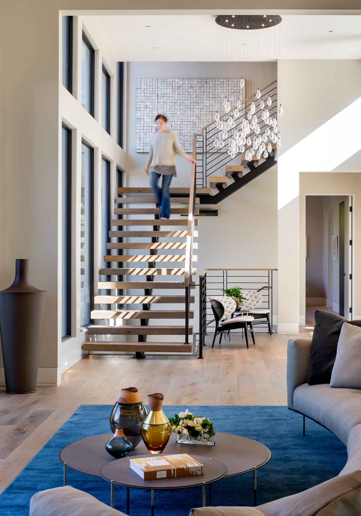 Scott Hargis Interior Design Photographer Staircase with woman Living Room